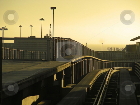 To use this stock image in your creative project, please select the size you need over to the right and click the "Add to Cart" button.
Your downloaded image will come with the Cutcaster watermark removed so don’t worry about the watermark you see on this page. Sunrise at SFO stock photo, Sunrise as the weary road warrior takes the train to the terminal at SFO. by Mary Lane
