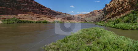 To use this stock image in your creative project, please select the size you need over to the right and click the "Add to Cart" button.
Your downloaded image will come with the Cutcaster watermark removed so don’t worry about the watermark you see on this page. Colorado River stock photo, The Colorado River cuts through the red rocks of Moab, Utah. by Mary Lane