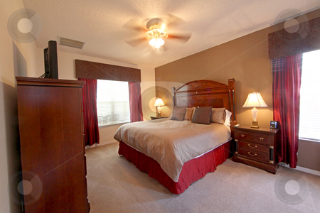 To use this stock image in your creative project, please select the size you need over to the right and click the "Add to Cart" button.
Your downloaded image will come with the Cutcaster watermark removed so don’t worry about the watermark you see on this page. King Master Bedroom stock photo, A King Master Bedroom, Interior Shot of a Home by Lucy Clark