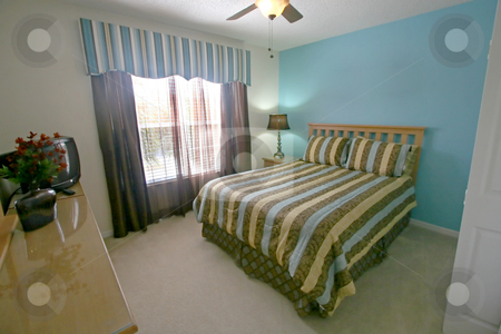 To use this stock image in your creative project, please select the size you need over to the right and click the "Add to Cart" button.
Your downloaded image will come with the Cutcaster watermark removed so don’t worry about the watermark you see on this page. Queen Bedroom stock photo, A Queen Bedroom, Interior Shot of a Home by Lucy Clark