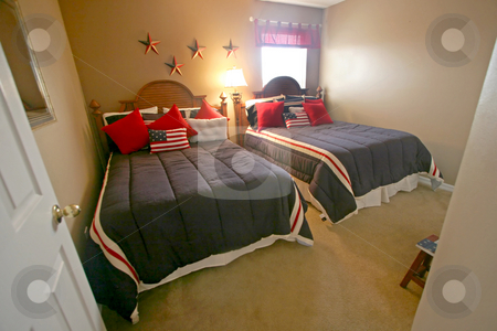 To use this stock image in your creative project, please select the size you need over to the right and click the "Add to Cart" button.
Your downloaded image will come with the Cutcaster watermark removed so don’t worry about the watermark you see on this page. Double Full Bedroom stock photo, A Double Full Bedroom, Interior Shot of a Home by Lucy Clark