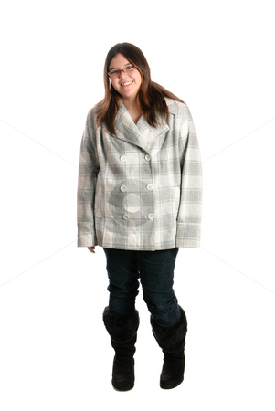 To use this stock image in your creative project, please select the size you need over to the right and click the "Add to Cart" button.
Your downloaded image will come with the Cutcaster watermark removed so don’t worry about the watermark you see on this page. Smiling Teen Wearing Winter Clothing stock photo, A full body view of a smiling brunette teenage girl is posing while wearing winter clothing, isolated against a white background by Richard Nelson