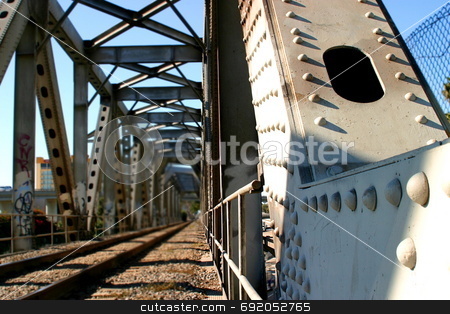 To use this stock image in your creative project, please select the size you need over to the right and click the "Add to Cart" button.
Your downloaded image will come with the Cutcaster watermark removed so don’t worry about the watermark you see on this page. Train Bridge stock photo, Train bridge in Ventura California by Henrik Lehnerer