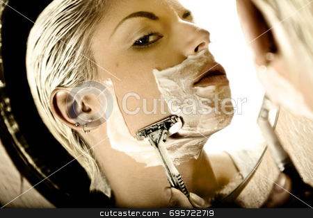 To use this stock image in your creative project, please select the size you need over to the right and click the "Add to Cart" button.
Your downloaded image will come with the Cutcaster watermark removed so don’t worry about the watermark you see on this page. Androgeny stock photo, Woman shaving her face with a razor by Luca Mosconi