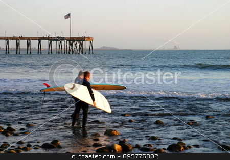 To use this stock image in your creative project, please select the size you need over to the right and click the "Add to Cart" button.
Your downloaded image will come with the Cutcaster watermark removed so don’t worry about the watermark you see on this page. Surfer at Sunset stock photo, Surfer at sunset at the beach near the pier in Ventura California. by Henrik Lehnerer