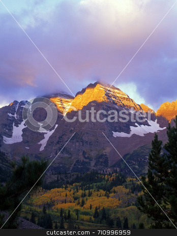 To use this stock image in your creative project, please select the size you need over to the right and click the "Add to Cart" button.
Your downloaded image will come with the Cutcaster watermark removed so don’t worry about the watermark you see on this page. Maroon Bells Streak stock photo, The Maroon Bells in the White River National Forest of Colorado. by Mike Norton