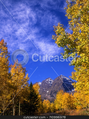 To use this stock image in your creative project, please select the size you need over to the right and click the "Add to Cart" button.
Your downloaded image will come with the Cutcaster watermark removed so don’t worry about the watermark you see on this page. Maroon Bells Vertical stock photo, The Maroon Bells in the White River National Forest of Colorado. by Mike Norton