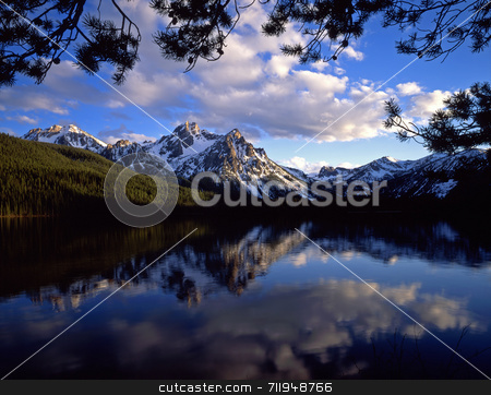 To use this stock image in your creative project, please select the size you need over to the right and click the "Add to Cart" button.
Your downloaded image will come with the Cutcaster watermark removed so don’t worry about the watermark you see on this page. Mt. McGown and Lake stock photo, Mt. McGown in the Sawtooth National Forest of Idaho. by Mike Norton