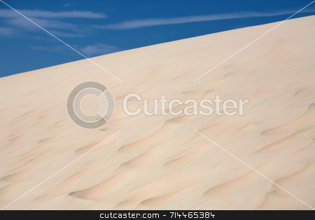 To use this stock image in your creative project, please select the size you need over to the right and click the "Add to Cart" button.
Your downloaded image will come with the Cutcaster watermark removed so don’t worry about the watermark you see on this page. Sand Dunes stock photo, Sand dunes with a nice blue sky and white clouds! by Daniel Wiedemann