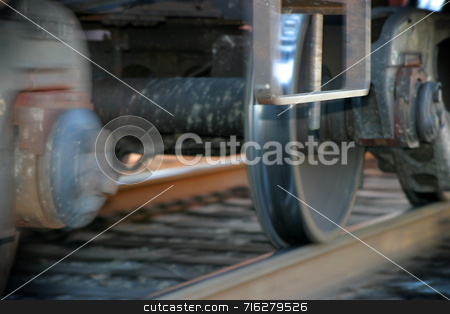 To use this stock image in your creative project, please select the size you need over to the right and click the "Add to Cart" button.
Your downloaded image will come with the Cutcaster watermark removed so don’t worry about the watermark you see on this page. Train Tires stock photo, Photo of a moving train with part of the photo blurred to show the movement by Henrik Lehnerer