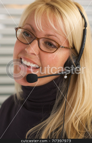 To use this stock image in your creative project, please select the size you need over to the right and click the "Add to Cart" button.
Your downloaded image will come with the Cutcaster watermark removed so don’t worry about the watermark you see on this page. Attractive Businesswoman with Phone Headset stock photo, Attractive businesswoman talks on her phone headset. by Andy Dean