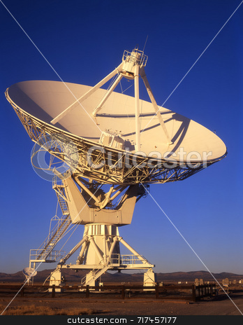 To use this stock image in your creative project, please select the size you need over to the right and click the "Add to Cart" button.
Your downloaded image will come with the Cutcaster watermark removed so don’t worry about the watermark you see on this page. Satellite Dish Daytime stock photo, A radio telescope part of the VLA, Very Large Array, in New Mexico. by Mike Norton