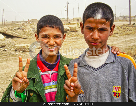To use this stock image in your creative project, please select the size you need over to the right and click the "Add to Cart" button.
Your downloaded image will come with the Cutcaster watermark removed so don’t worry about the watermark you see on this page. Iraqi Hope stock photo, Two Iraqi children giving the V sign for victory by Stefan Edwards