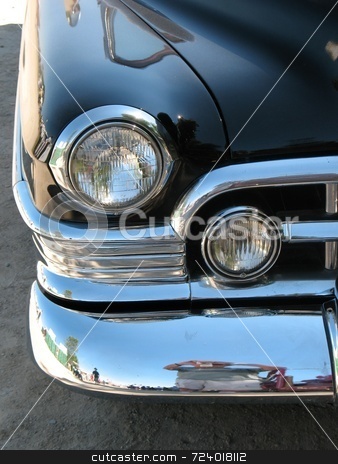 To use this stock image in your creative project, please select the size you need over to the right and click the "Add to Cart" button.
Your downloaded image will come with the Cutcaster watermark removed so don’t worry about the watermark you see on this page. Vintage Automobile stock photo, Image of the front right fender showing the headlights of a 1950 Cadillac. by Ray Carpenter