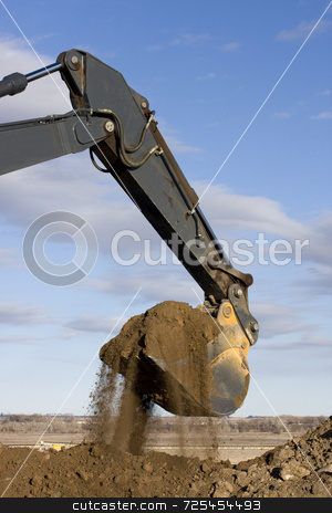 To use this stock image in your creative project, please select the size you need over to the right and click the "Add to Cart" button.
Your downloaded image will come with the Cutcaster watermark removed so don’t worry about the watermark you see on this page. Excavator arm and scoop digging dirt at road construction stock photo, Excavator arm and scoop full of dirt at road construction against blue sky by Marek Uliasz