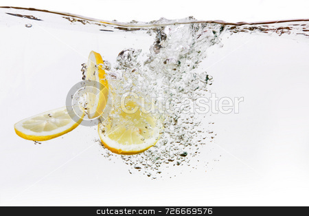 To use this stock image in your creative project, please select the size you need over to the right and click the "Add to Cart" button.
Your downloaded image will come with the Cutcaster watermark removed so don’t worry about the watermark you see on this page. Lemon Slice Water Drop stock photo, A group of lemon slices dropped in water with bubbles by Tyler Olson