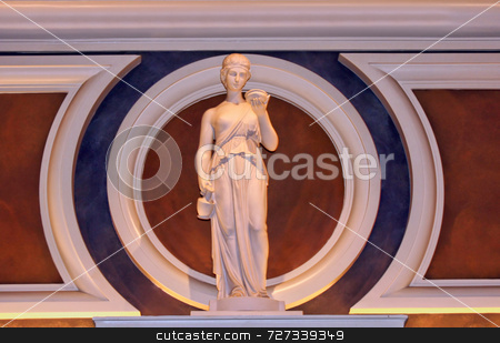 To use this stock image in your creative project, please select the size you need over to the right and click the "Add to Cart" button.
Your downloaded image will come with the Cutcaster watermark removed so don’t worry about the watermark you see on this page. Classical Female Statue stock photo, Single classical female statue holding out her hand by Kevin Tietz