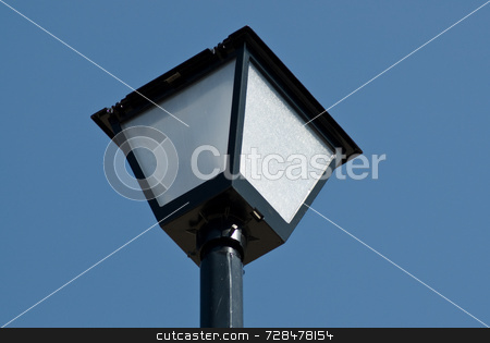 To use this stock image in your creative project, please select the size you need over to the right and click the "Add to Cart" button.
Your downloaded image will come with the Cutcaster watermark removed so don’t worry about the watermark you see on this page. Close-up Lamp Post stock photo, Close up view of a lamp post shot against a cloudless blue sky by Richard Nelson