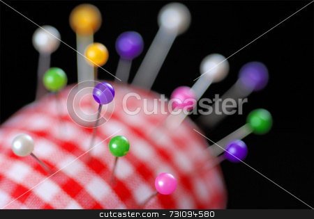 To use this stock image in your creative project, please select the size you need over to the right and click the "Add to Cart" button.
Your downloaded image will come with the Cutcaster watermark removed so don’t worry about the watermark you see on this page. Pin Cushion stock photo, A red gingham pin cushion full of pins by Philippa Willitts
