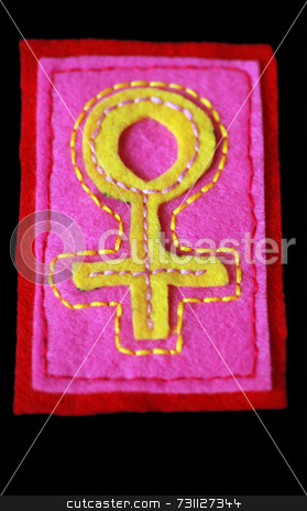 To use this stock image in your creative project, please select the size you need over to the right and click the "Add to Cart" button.
Your downloaded image will come with the Cutcaster watermark removed so don’t worry about the watermark you see on this page. Embroidered Venus Symbol stock photo, A hand-sewn venus symbol on felt with a black background by Philippa Willitts