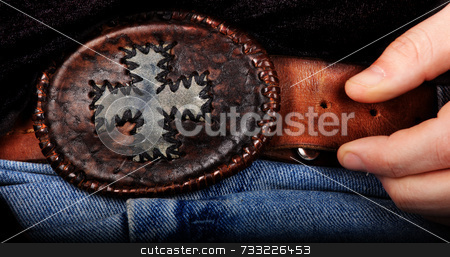 To use this stock image in your creative project, please select the size you need over to the right and click the "Add to Cart" button.
Your downloaded image will come with the Cutcaster watermark removed so don’t worry about the watermark you see on this page. Cowboy belt buckle at rodeo stock photo, by Chris Martin