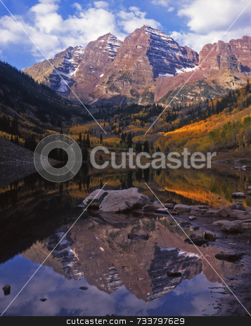 To use this stock image in your creative project, please select the size you need over to the right and click the "Add to Cart" button.
Your downloaded image will come with the Cutcaster watermark removed so don’t worry about the watermark you see on this page. Maroon Bells stock photo, The twin peaks of the Maroon Bells in the White River National Forest, Colorado. by Mike Norton