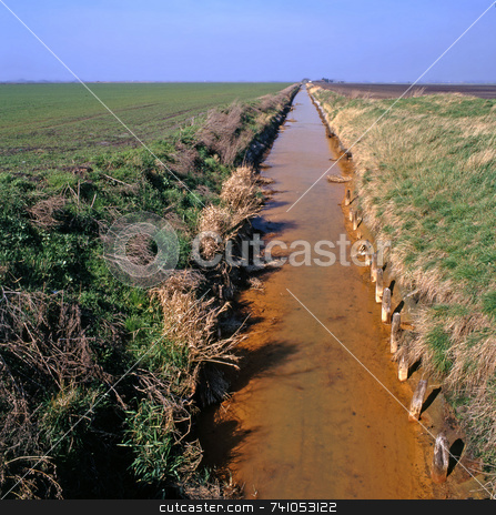 To use this stock image in your creative project, please select the size you need over to the right and click the "Add to Cart" button.
Your downloaded image will come with the Cutcaster watermark removed so don’t worry about the watermark you see on this page. Fens stock photo, Fenland in the east of England near the town of March by Paul Phillips