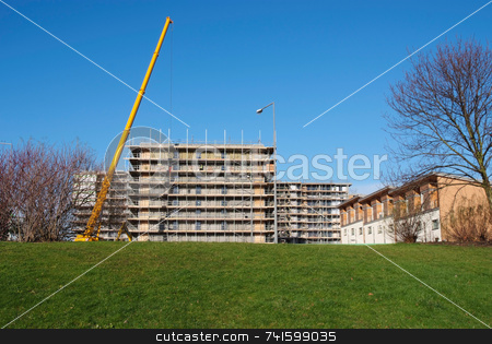 To use this stock image in your creative project, please select the size you need over to the right and click the "Add to Cart" button.
Your downloaded image will come with the Cutcaster watermark removed so don’t worry about the watermark you see on this page. New Building stock photo, Construction of a new high-rise building in a city center by Paul Phillips