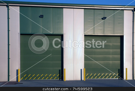 To use this stock image in your creative project, please select the size you need over to the right and click the "Add to Cart" button.
Your downloaded image will come with the Cutcaster watermark removed so don’t worry about the watermark you see on this page. Closed stock photo, Two large doors of a modern industrial unit by Paul Phillips