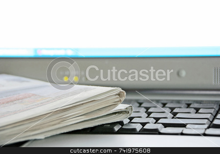 To use this stock image in your creative project, please select the size you need over to the right and click the "Add to Cart" button.
Your downloaded image will come with the Cutcaster watermark removed so don’t worry about the watermark you see on this page. Newspaper and Computer stock photo, A newspaper on the keyboard of a laptop computer (focus is on the corner of the newspaper) by Georgios Alexandris