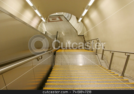 To use this stock image in your creative project, please select the size you need over to the right and click the "Add to Cart" button.
Your downloaded image will come with the Cutcaster watermark removed so don’t worry about the watermark you see on this page. Subway Staircase stock photo, The staircase leading to the platform of a subway station by Georgios Alexandris