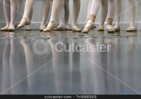 To use this stock image in your creative project, please select the size you need over to the right and click the "Add to Cart" button.
Your downloaded image will come with the Cutcaster watermark removed so don’t worry about the watermark you see on this page. Dance stock photo, Young dancers... low angle shot of just feet and legs - this view has had the color removed from the floor and wall. by Mitch Aunger