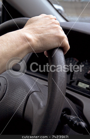 To use this stock image in your creative project, please select the size you need over to the right and click the "Add to Cart" button.
Your downloaded image will come with the Cutcaster watermark removed so don’t worry about the watermark you see on this page. Driving stock photo, Holding steering wheel by Jack Schiffer