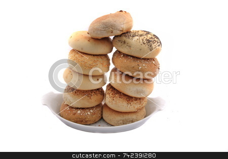 To use this stock image in your creative project, please select the size you need over to the right and click the "Add to Cart" button.
Your downloaded image will come with the Cutcaster watermark removed so don’t worry about the watermark you see on this page. Bagels stock photo, Stacked bagels on isolated by Jack Schiffer