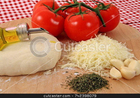 To use this stock image in your creative project, please select the size you need over to the right and click the "Add to Cart" button.
Your downloaded image will come with the Cutcaster watermark removed so don’t worry about the watermark you see on this page. Pizza Ingredients stock photo, The makings of a real pizza by Jack Schiffer
