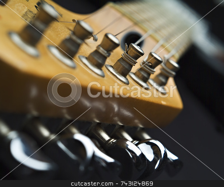 To use this stock image in your creative project, please select the size you need over to the right and click the "Add to Cart" button.
Your downloaded image will come with the Cutcaster watermark removed so don’t worry about the watermark you see on this page. Close up of guitar machine head stock photo, Close up of guitar machine head by Vince Clements