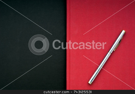 To use this stock image in your creative project, please select the size you need over to the right and click the "Add to Cart" button.
Your downloaded image will come with the Cutcaster watermark removed so don’t worry about the watermark you see on this page. Bright red book on a black background stock photo, A stricking image of a silver pen on a bright red book on a black background by Vince Clements