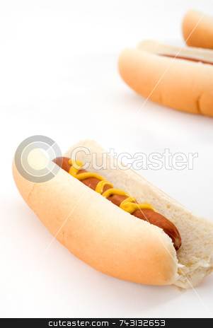 To use this stock image in your creative project, please select the size you need over to the right and click the "Add to Cart" button.
Your downloaded image will come with the Cutcaster watermark removed so don’t worry about the watermark you see on this page. Hot dogs stock photo, Closeup of hotdogs with mustard by Vince Clements