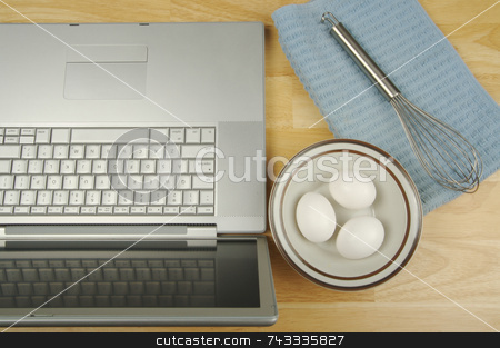 To use this stock image in your creative project, please select the size you need over to the right and click the "Add to Cart" button.
Your downloaded image will come with the Cutcaster watermark removed so don’t worry about the watermark you see on this page. Laptop, eggs and mixer stock photo, Laptop, eggs and mixer - online research for cooking and recipe information. by Andy Dean