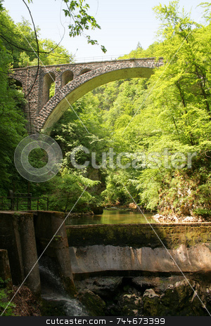 To use this stock image in your creative project, please select the size you need over to the right and click the "Add to Cart" button.
Your downloaded image will come with the Cutcaster watermark removed so don’t worry about the watermark you see on this page. Bridge stock photo, by Greg Peterson