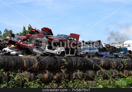 To use this stock image in your creative project, please select the size you need over to the right and click the "Add to Cart" button.
Your downloaded image will come with the Cutcaster watermark removed so don’t worry about the watermark you see on this page. Junkyard stock photo, Automotive junkyard recycling center by Jack Schiffer