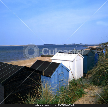 To use this stock image in your creative project, please select the size you need over to the right and click the "Add to Cart" button.
Your downloaded image will come with the Cutcaster watermark removed so don’t worry about the watermark you see on this page. Beach Huts stock photo, Several beach huts by the sea by Paul Phillips