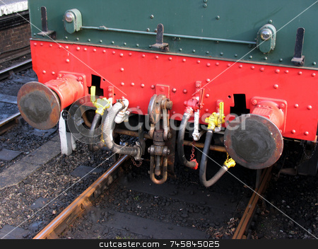To use this stock image in your creative project, please select the size you need over to the right and click the "Add to Cart" button.
Your downloaded image will come with the Cutcaster watermark removed so don’t worry about the watermark you see on this page. End of a railway car stock photo, Train buffers of an old steam train by Paul Phillips