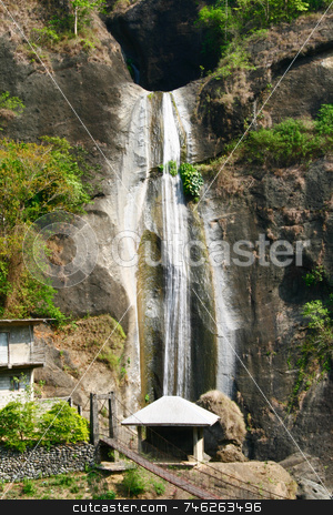 To use this stock image in your creative project, please select the size you need over to the right and click the "Add to Cart" button.
Your downloaded image will come with the Cutcaster watermark removed so don’t worry about the watermark you see on this page. Cave waterfalls stock photo, Overlooking waterfalls coming from a cave by Jonas Marcos San Luis