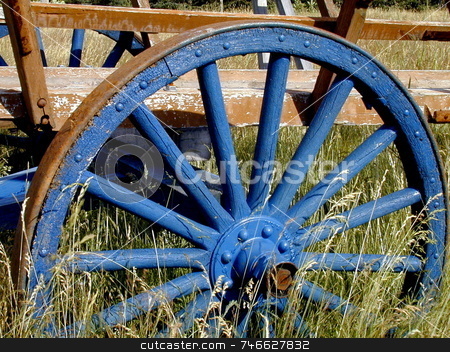To use this stock image in your creative project, please select the size you need over to the right and click the "Add to Cart" button.
Your downloaded image will come with the Cutcaster watermark removed so don’t worry about the watermark you see on this page. Old Blue Wheel stock photo, An old wooden wheel, painted in rich blue by Tom and Beth Pulsipher