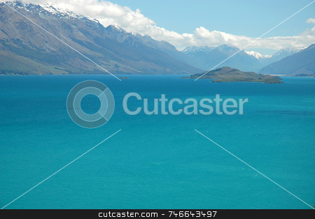 To use this stock image in your creative project, please select the size you need over to the right and click the "Add to Cart" button.
Your downloaded image will come with the Cutcaster watermark removed so don’t worry about the watermark you see on this page. Blue Paradise - mountain lake stock photo, Vibrant turquoise colour lake surrounded by snow mountain peaks. Lake Whakatipu, Queenstown, New Zealand. by Irina Yun