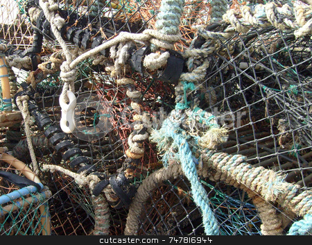 To use this stock image in your creative project, please select the size you need over to the right and click the "Add to Cart" button.
Your downloaded image will come with the Cutcaster watermark removed so don’t worry about the watermark you see on this page. Lobster pots in harbor stock photo, Lobster pots in harbor by Martin Crowdy
