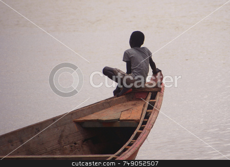 To use this stock image in your creative project, please select the size you need over to the right and click the "Add to Cart" button.
Your downloaded image will come with the Cutcaster watermark removed so don’t worry about the watermark you see on this page. On the edge stock photo, Child on a boat at Sengal river by Kobby Dagan