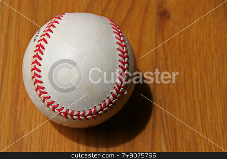 To use this stock image in your creative project, please select the size you need over to the right and click the "Add to Cart" button.
Your downloaded image will come with the Cutcaster watermark removed so don’t worry about the watermark you see on this page. Baseball stock photo, A slightly Worn baseball on wood background by Darryl Brooks