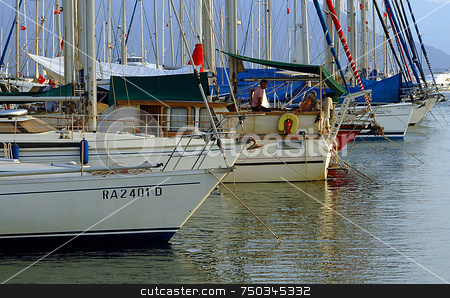 To use this stock image in your creative project, please select the size you need over to the right and click the "Add to Cart" button.
Your downloaded image will come with the Cutcaster watermark removed so don’t worry about the watermark you see on this page. Yachtes stock photo, Yachtes in Marmaris marina by Kobby Dagan